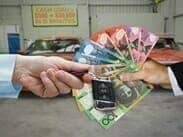 Cash-Fast-Loans-Borrower-With-Cash-In-Hand